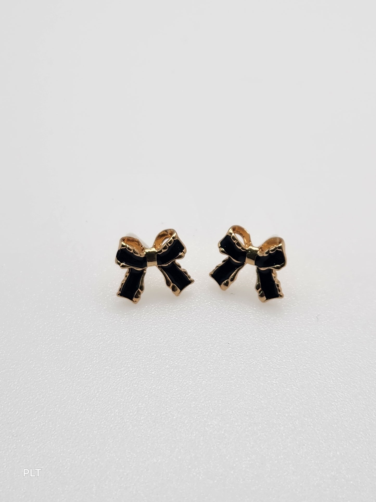 Black gold bow earrings